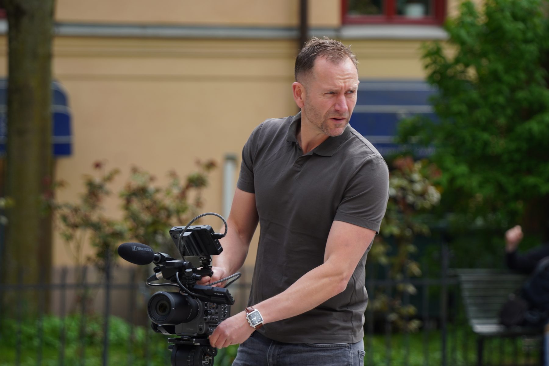 Paul Rhys filming on a Stockholm street